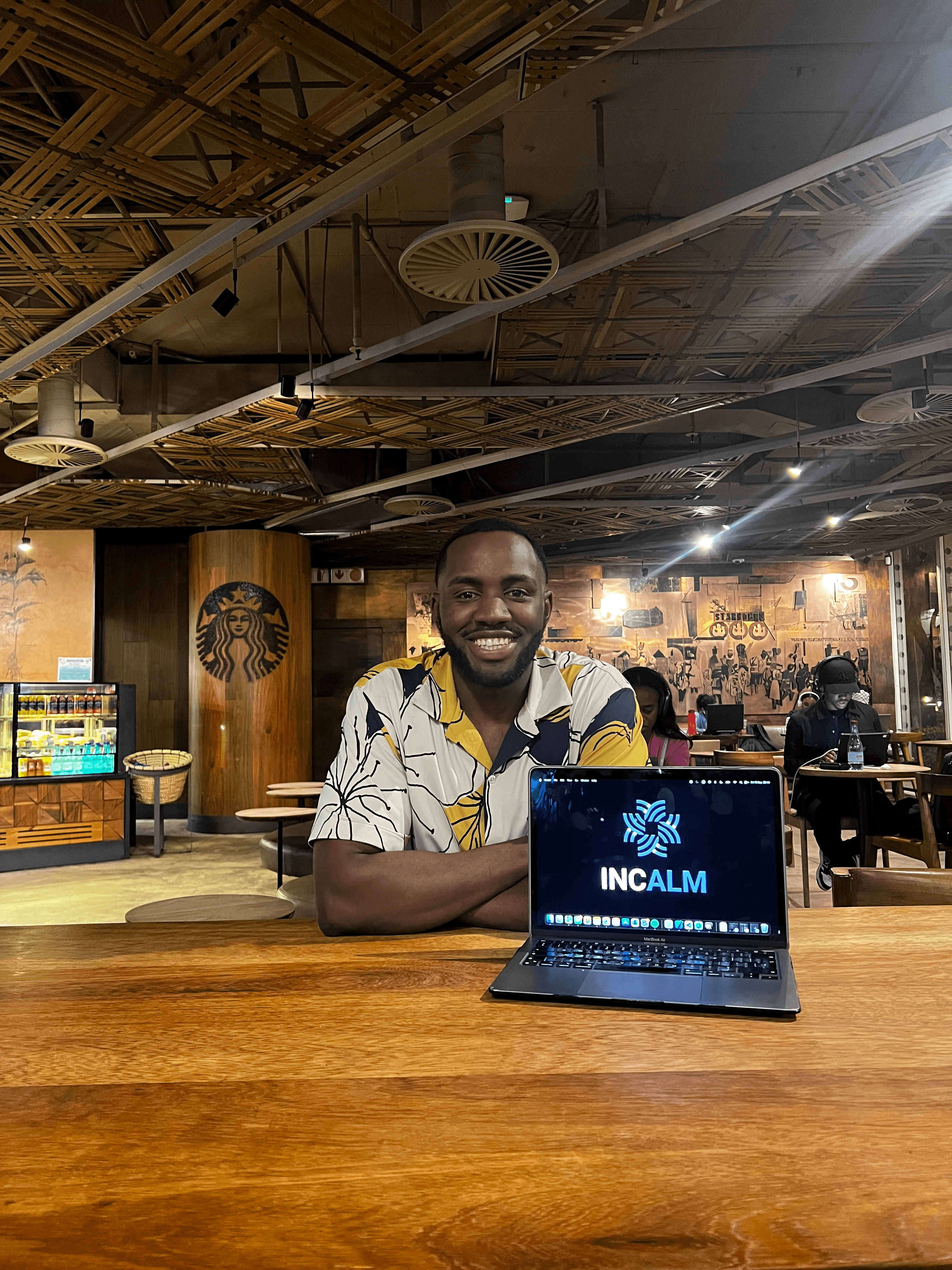 Incalm founder with laptop